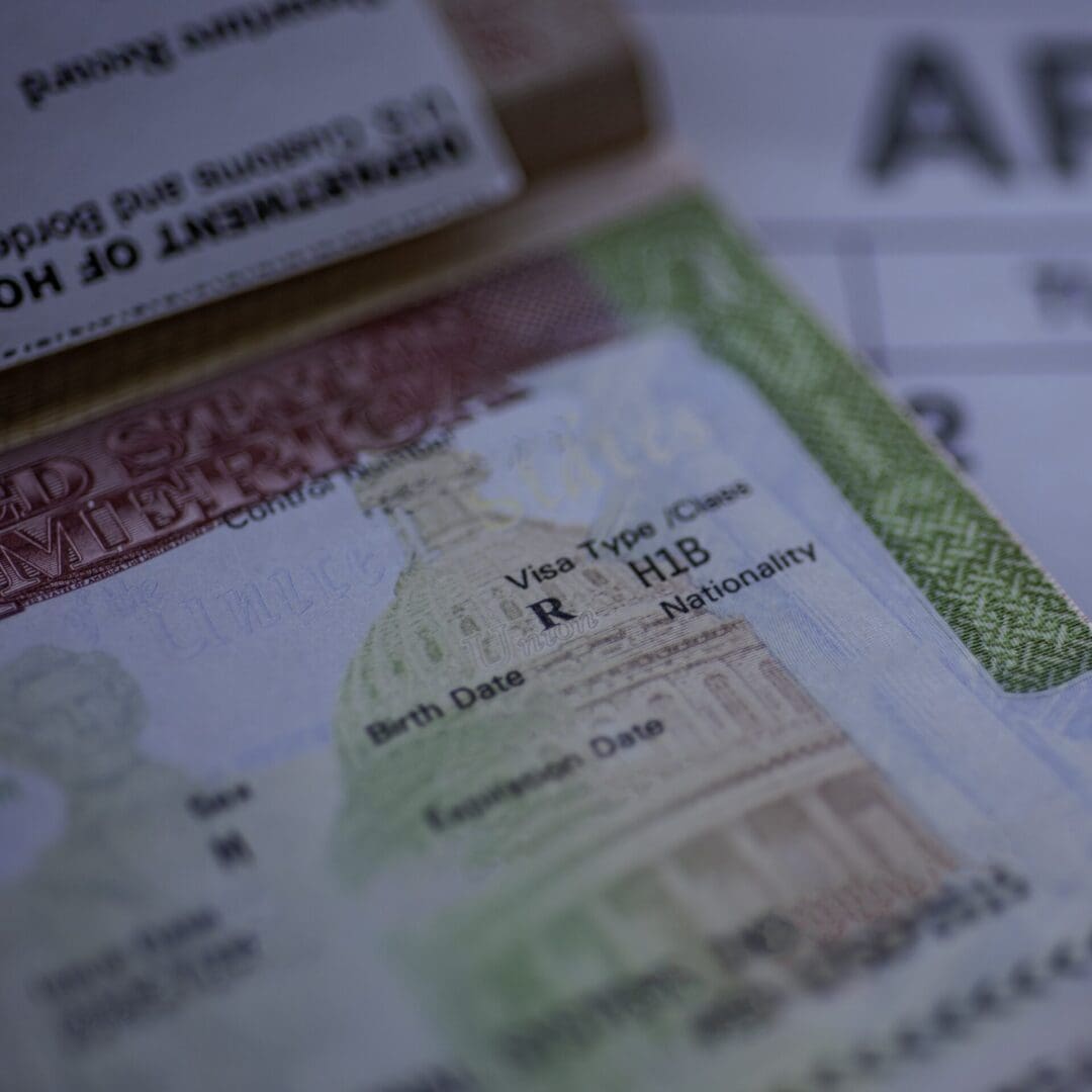 A close up of the passport and visa